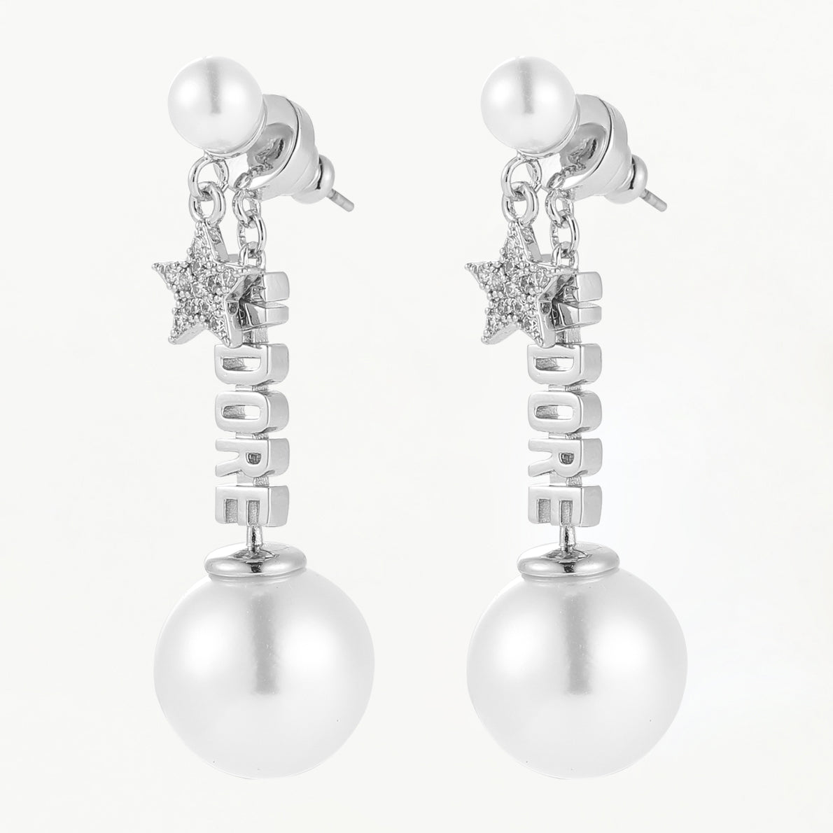 Ohrringe J‘adore Perle hängend